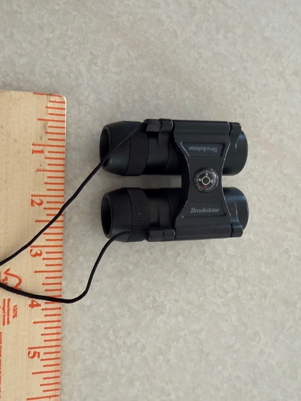 Brookstone Compact Black Binoculars with Red Lenses - Picture 2 of 9